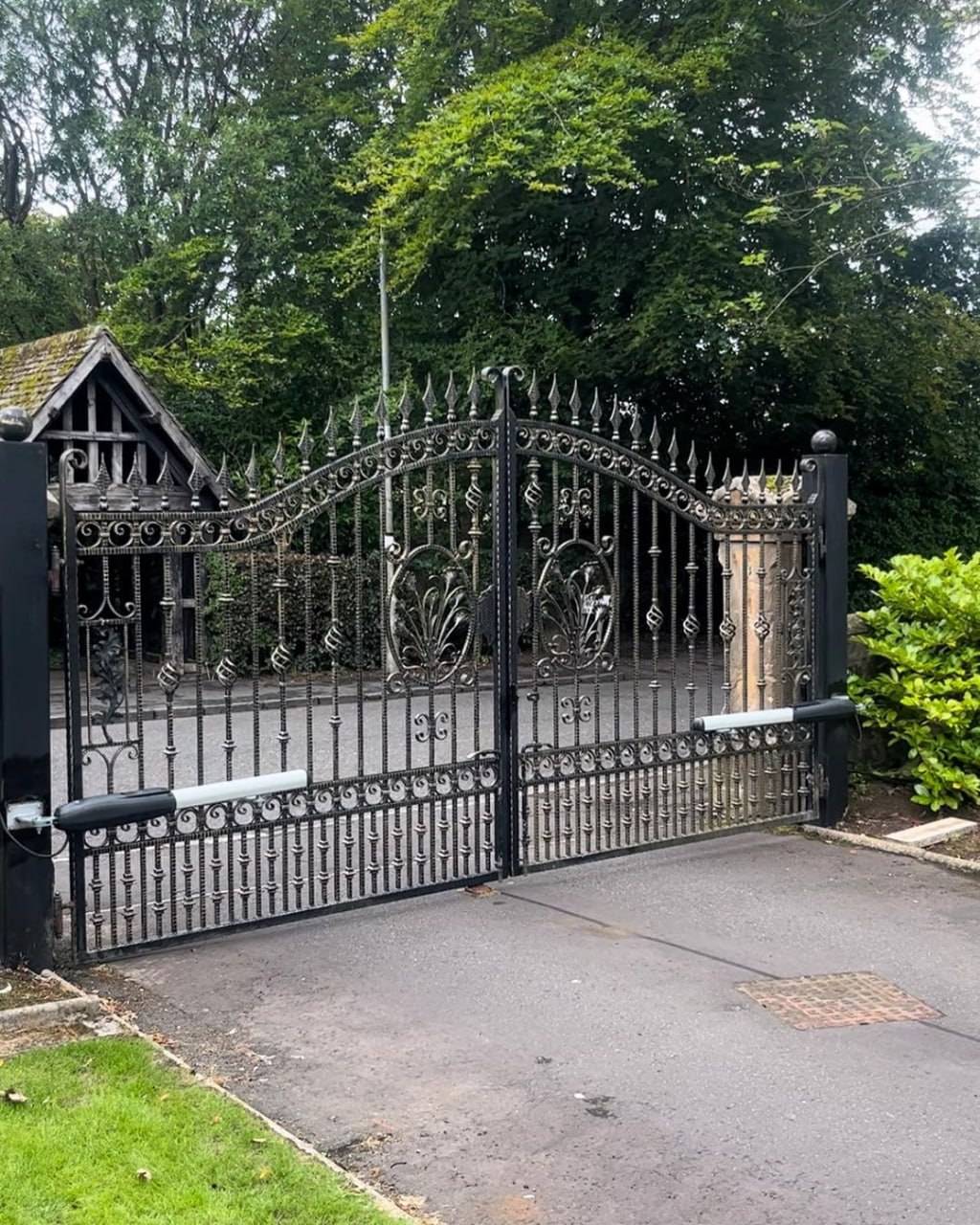 Ornate bespoke steel driveway gate installation