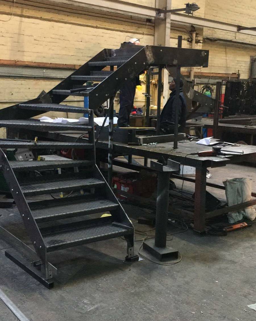Steel staircase fabrication on the Stairforge London workshop floor