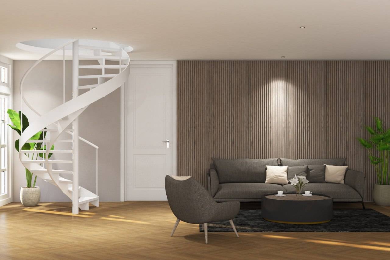 White spiral staircase rising through a circular ceiling opening in a modern living room with oak herringbone flooring