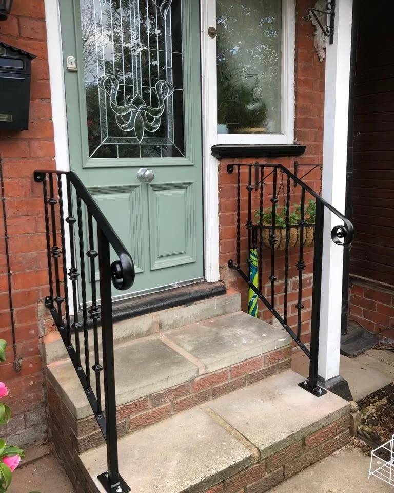 Traditional entrance railing installation