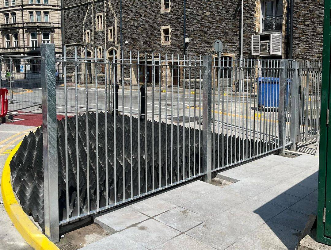 Black perimeter security fencing installation